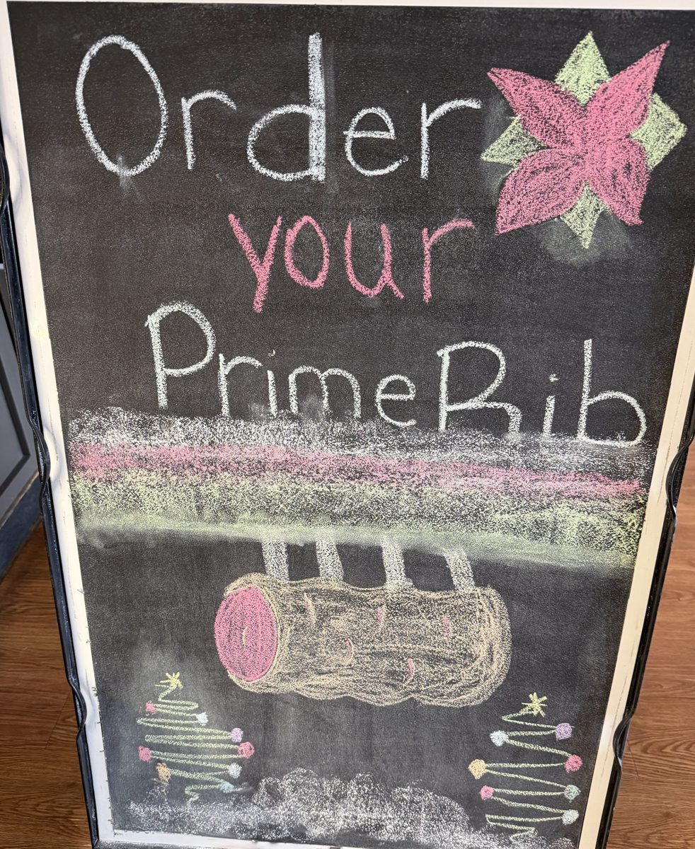 Chalkboard sign in the shop: Order your prime rib